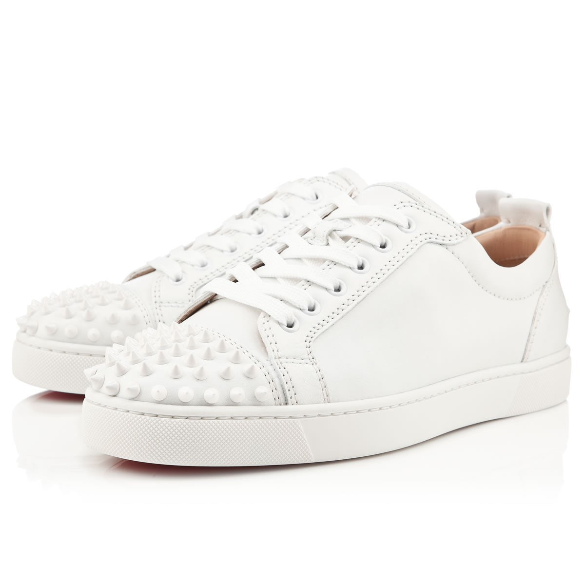 CL- LEATHER WHITE SPIKES